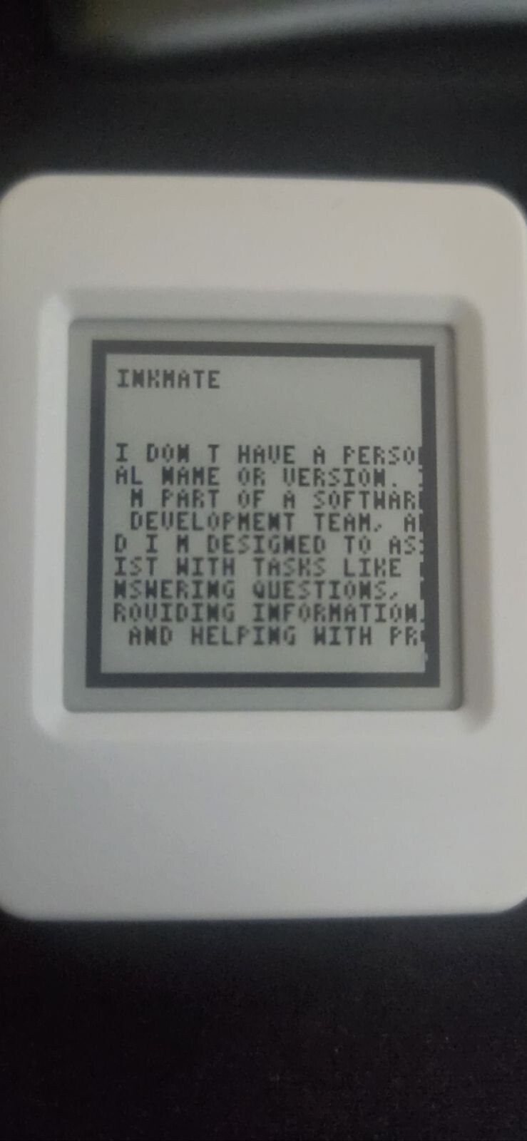 V2 device showing a returned response card on its e-paper display