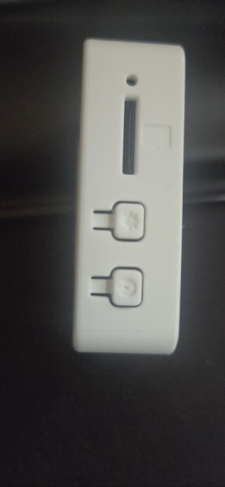 Side view of the V2 device showing the BOOT and PWR controls